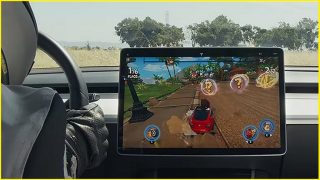 Tesla update lets passengers play while moving