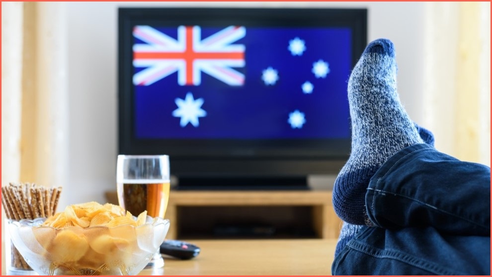 Person watching TV displaying an Australian flag