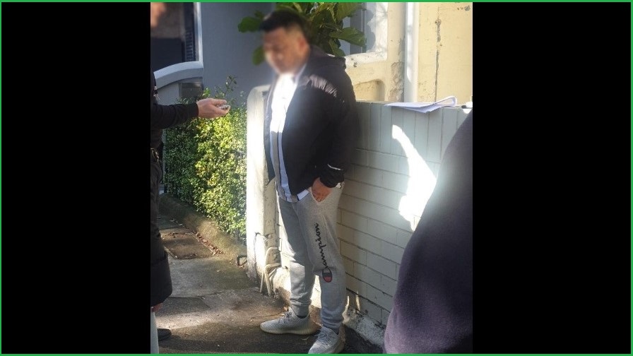 Blurred image of arrested man