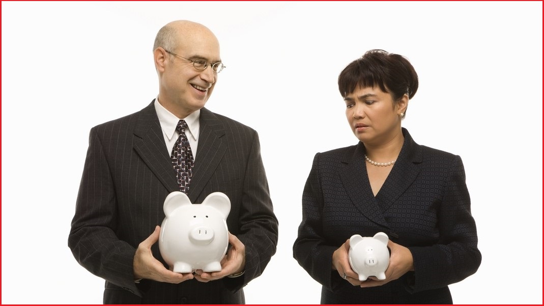 A man and woman each holding a piggy bank but the woman's is much smaller