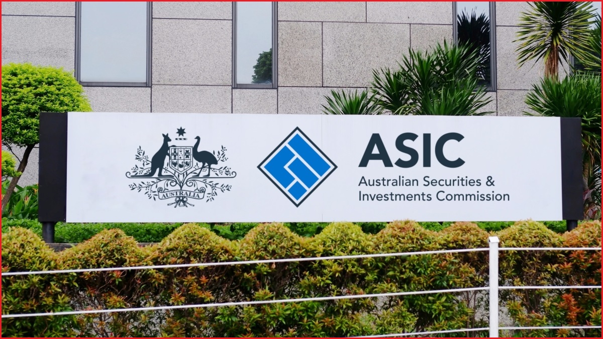 A close up of a sign surrounded by plants, which displays the ASIC logo and Australian coat of arms.