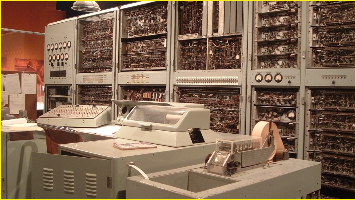 A medium shot of the large CSIRAC computer, with its many old panels and cables.