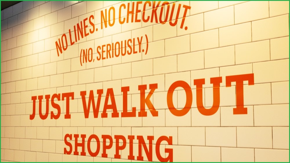 'Just Walk Out Shopping' sign in an Amazon Fresh Store