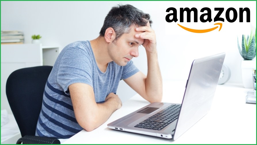 Frustrated man looking at a laptop screen