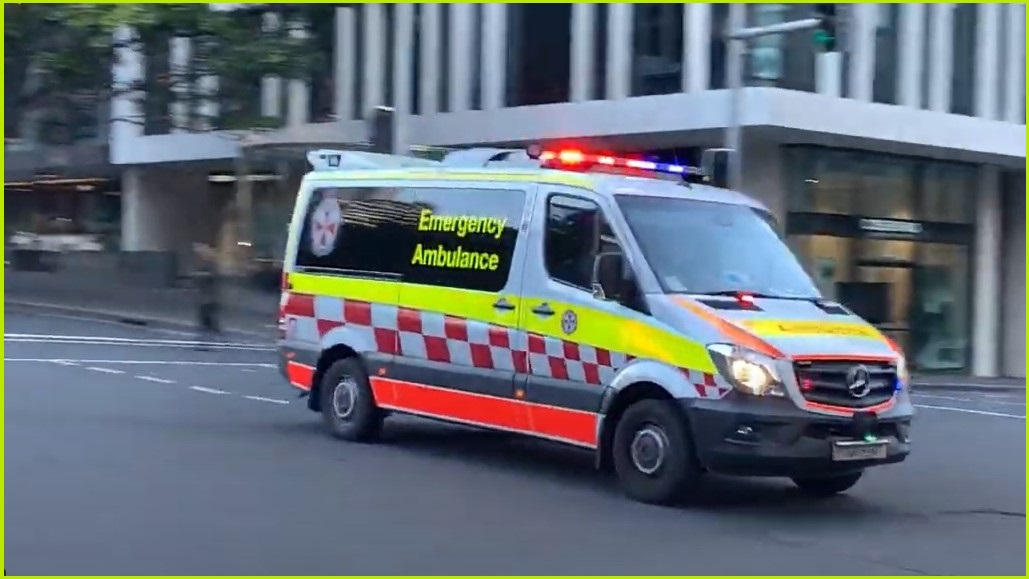 Ambulance zooming on a Sydney street. 