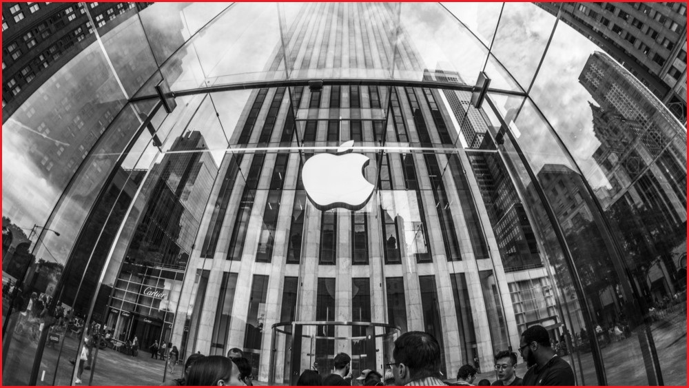 Black-and-white image of Apple store frontage.