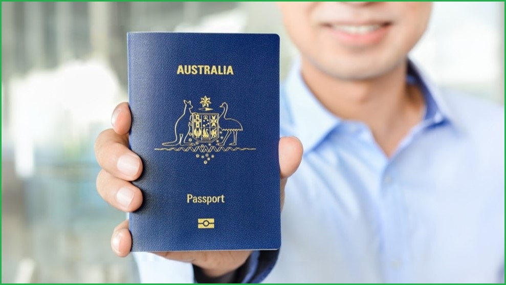 Man holding an Australian passport.