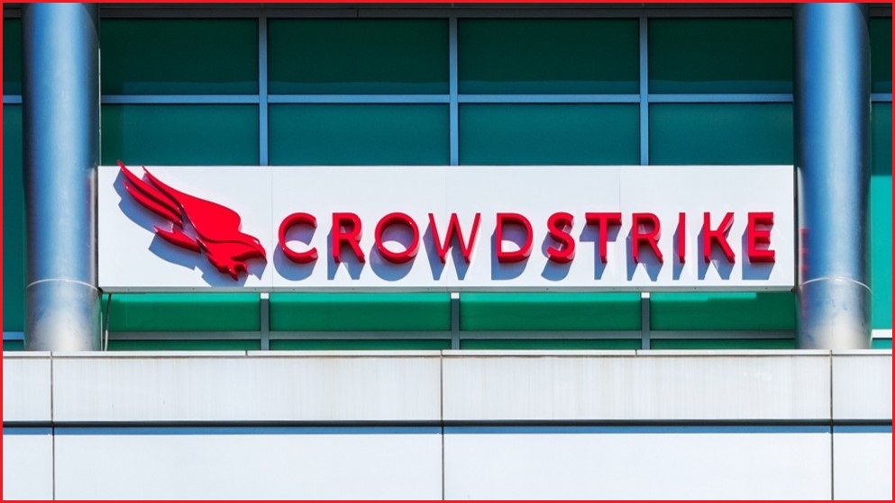 A close up of the CrowdStrike logo, featuring a large bird, on the side of an office building.