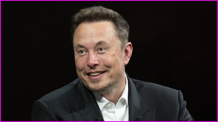 Elon Musk grinning