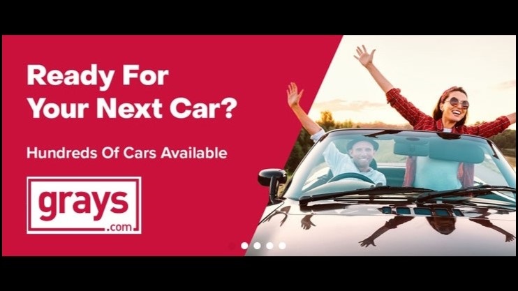 Splash screen ad promoting cars being sold by Grays