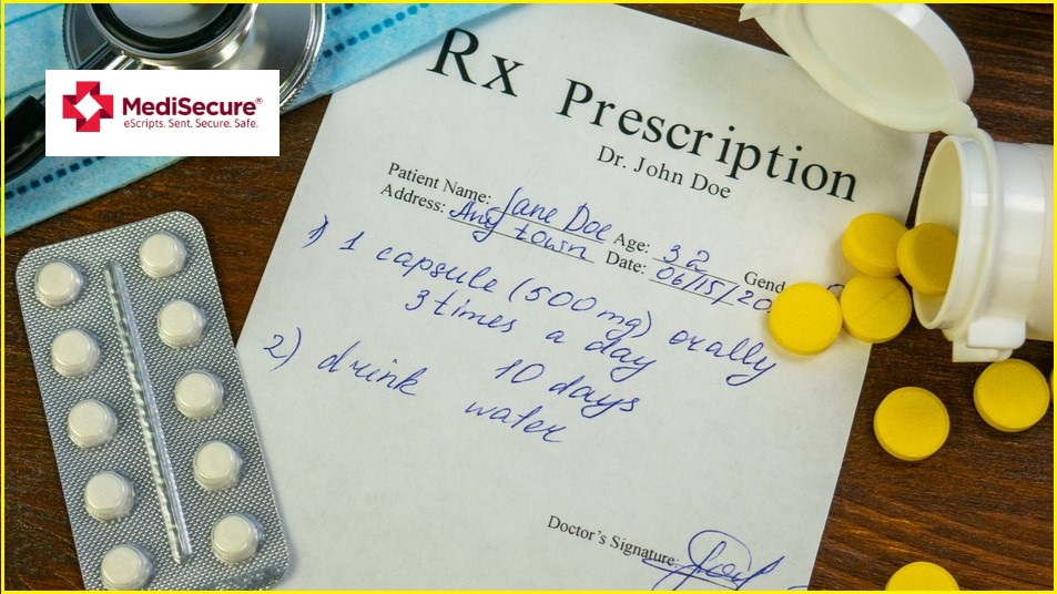 Medical script surrounded by pills