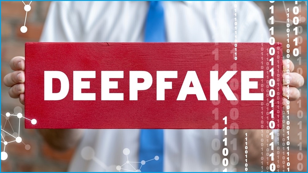 Man holding sign that says DEEPFAKE.