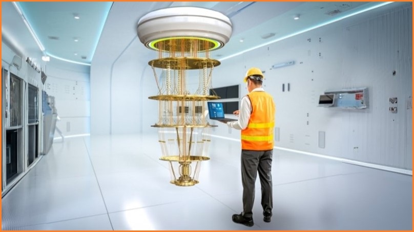 Man in high-vis vest standing next to quantum computer, running some tests on his laptop.