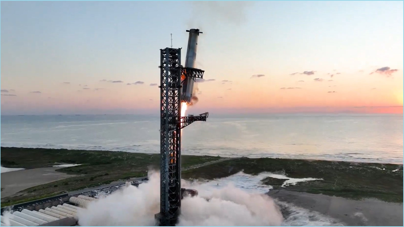 Starship booster returning to the take-off tower. 