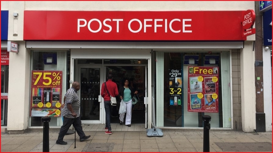 Storefront of UK post office.