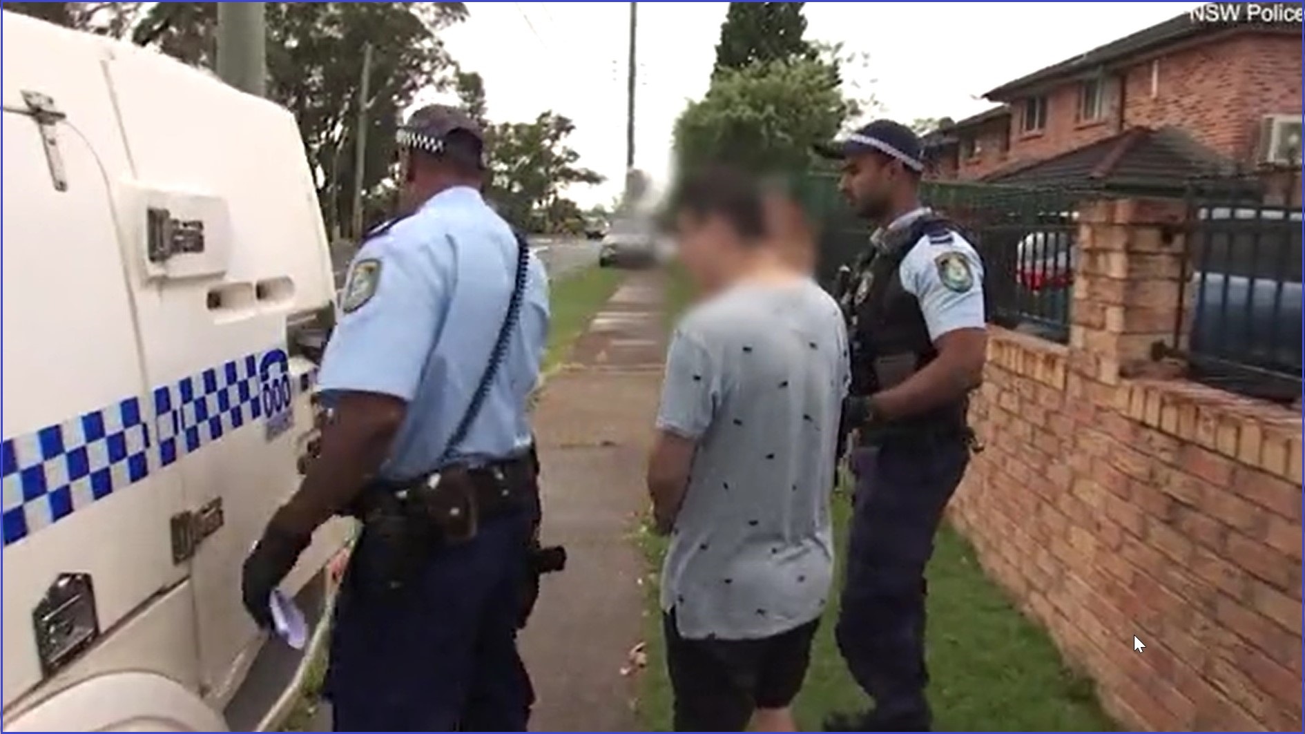 Xuan Su being arrested by NSW Police