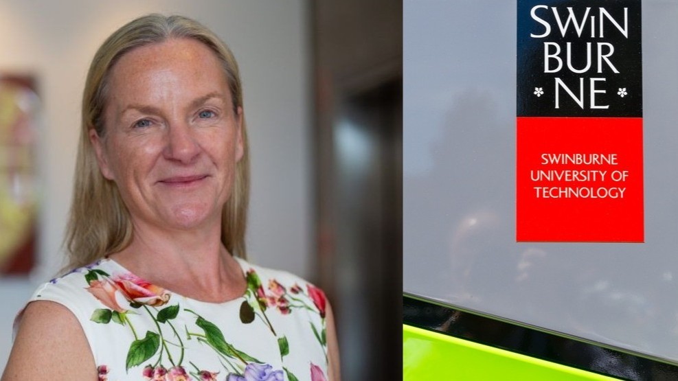 Professor Laura-Anne Bull next to Swinburne signage.