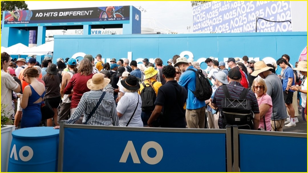 A medium shot of people lining up outside to enter the Australian Open in Melbourne.