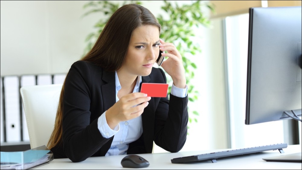 Woman on phone trying to cancel subscription service