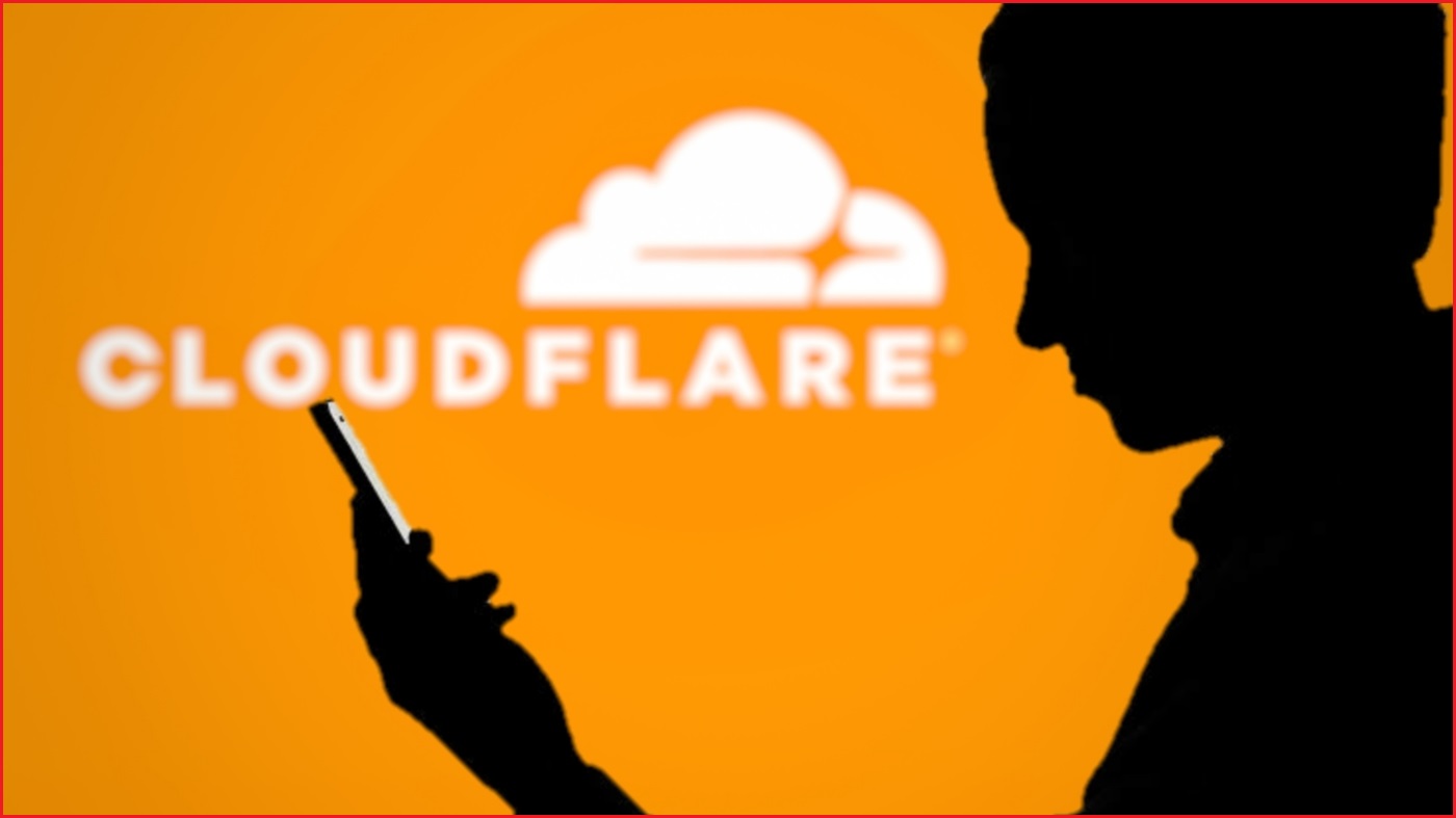 A silhouette of a person holding a smartphone in the foreground. In the background, the Cloudflare logo.