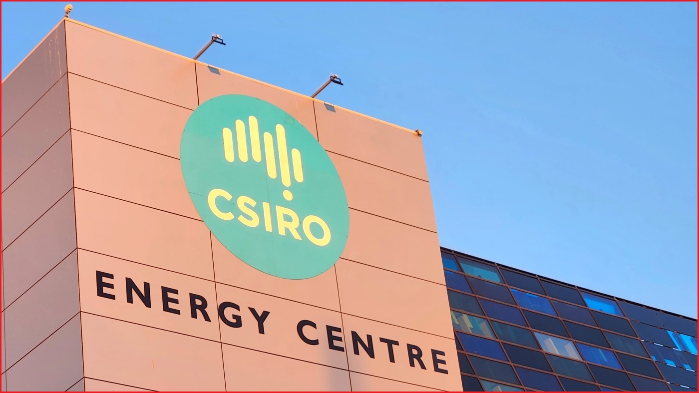 A close up of the CSIRO logo on the side of a building, with the sky in the background. Under the logo are the words "Energy Centre"