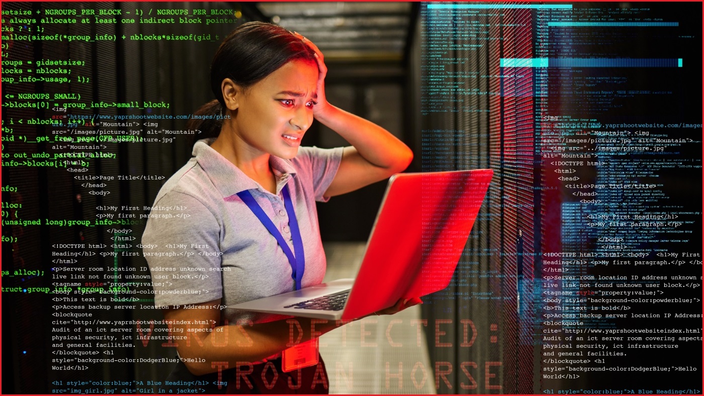 A medium shot of a female engineer in a server room, looking at a laptop with concern, with parts of computer code floating around her.