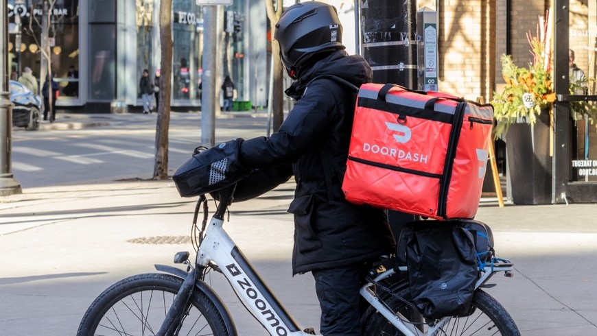 Doordash rider on a bike.