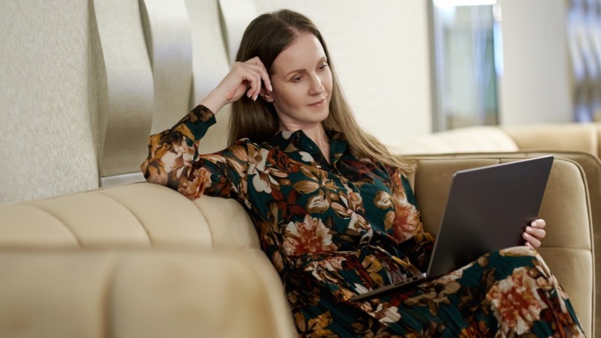 Female executive working remotely on her laptop.