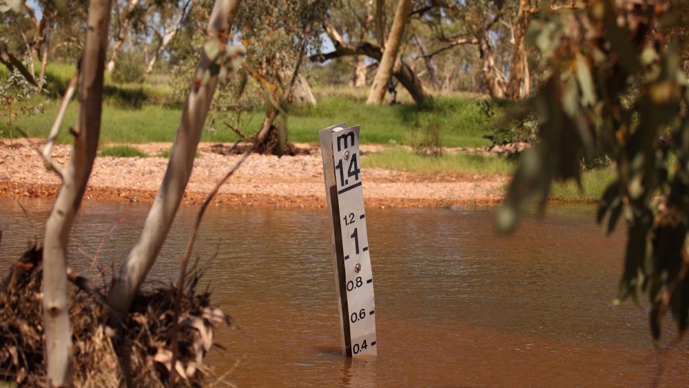 Marker in a river showing the height of the water.