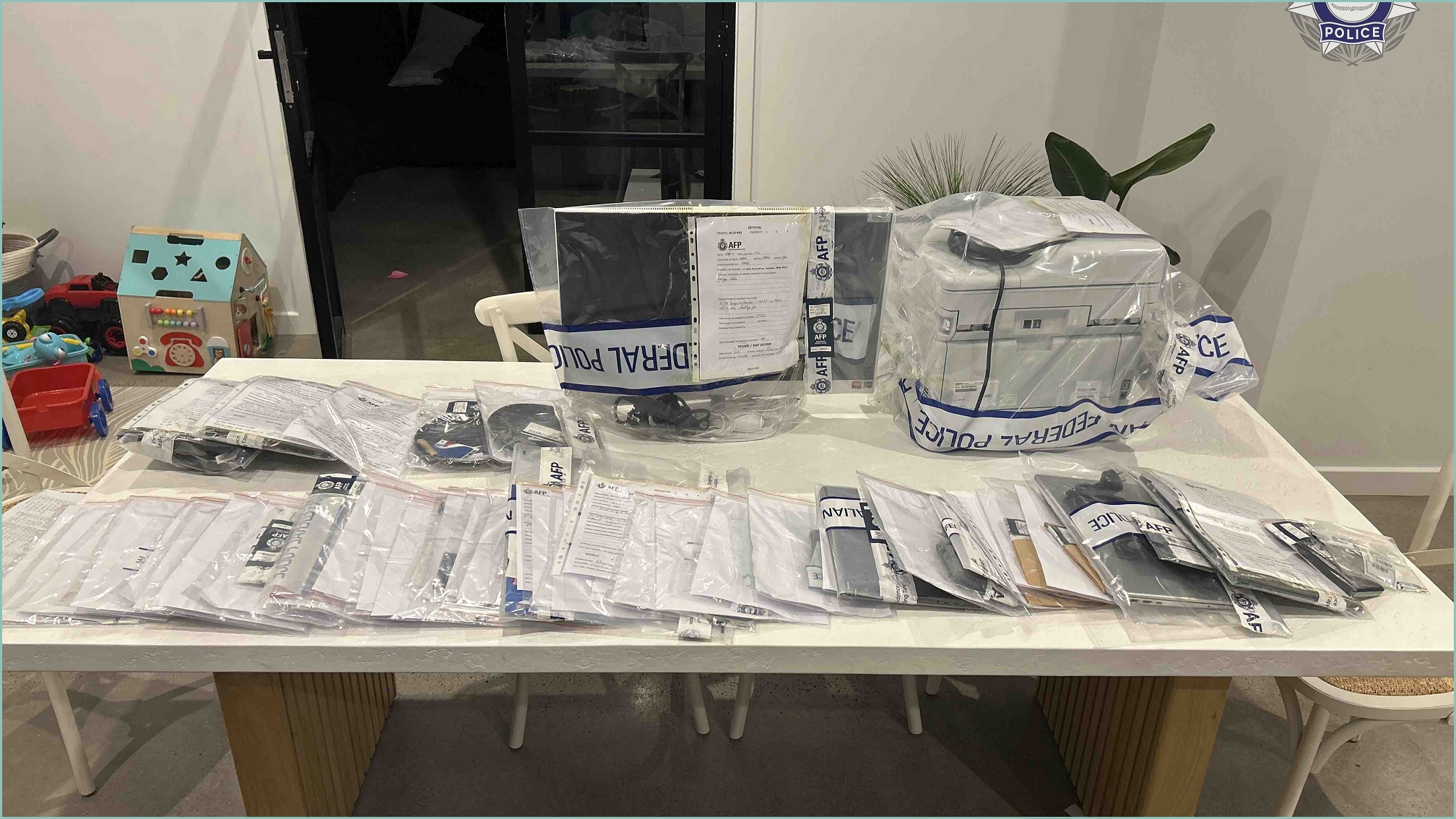 A table with multiple bagged items.