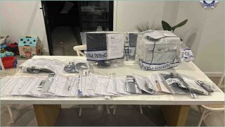 Phishing suspect hid phones in backyard drain