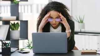 Unhappy workers stay put in ‘job hugging’ trend