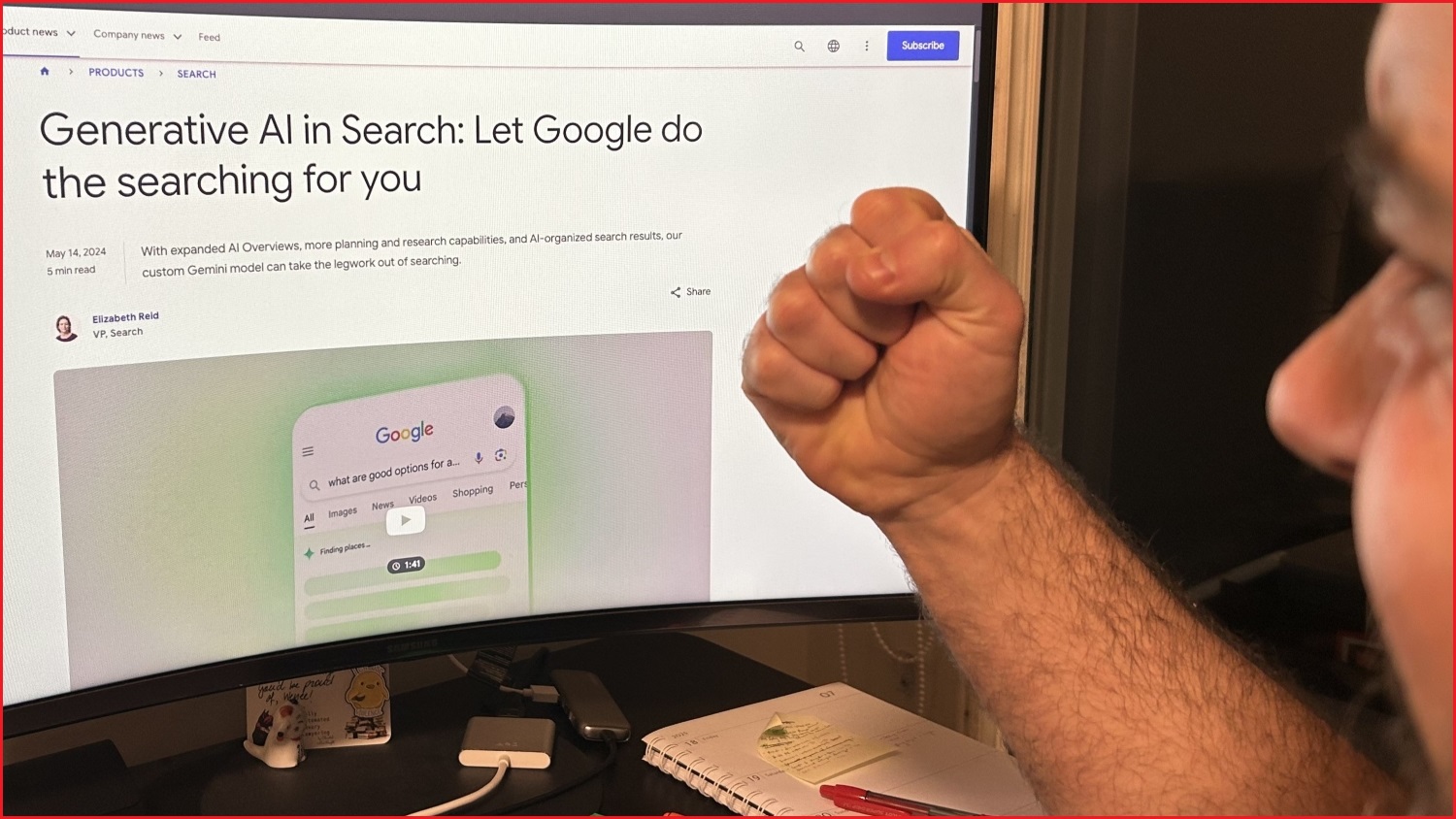 A close up of a man clenching his fist and shaking it at a computer screen, which is displaying a page titled 'Generative AI in Search: Let Google do the searching for you'