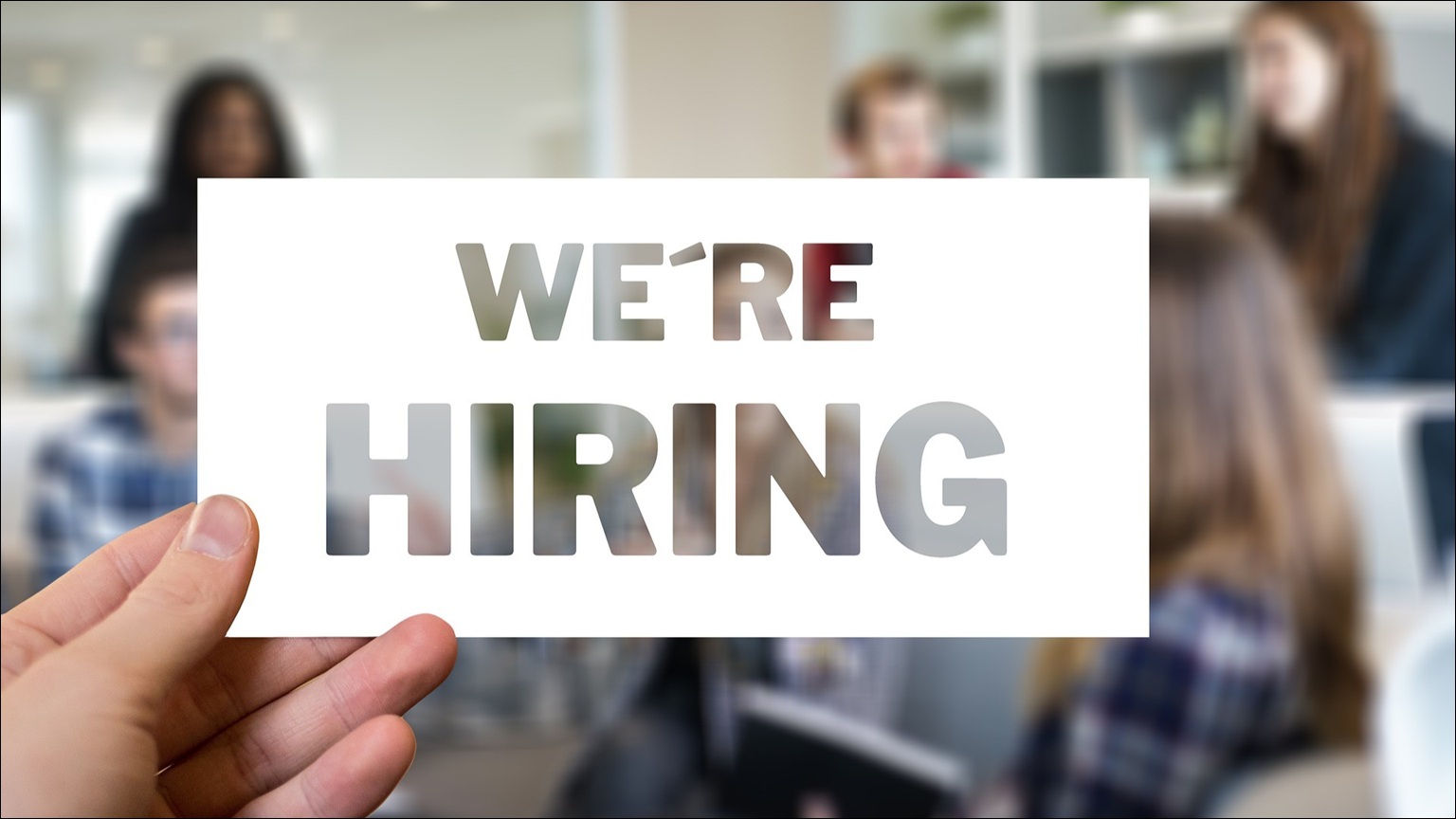 Sign that reads 'We're Hiring'