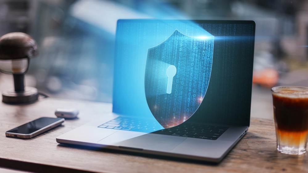Laptop screen showing keyhole image.