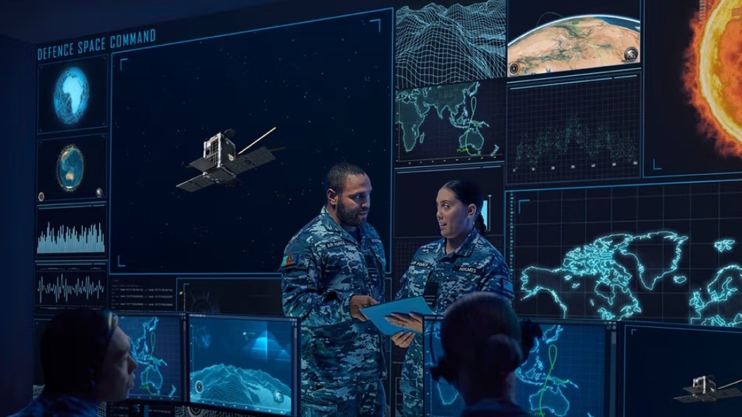 ADF personnel working in command centre.