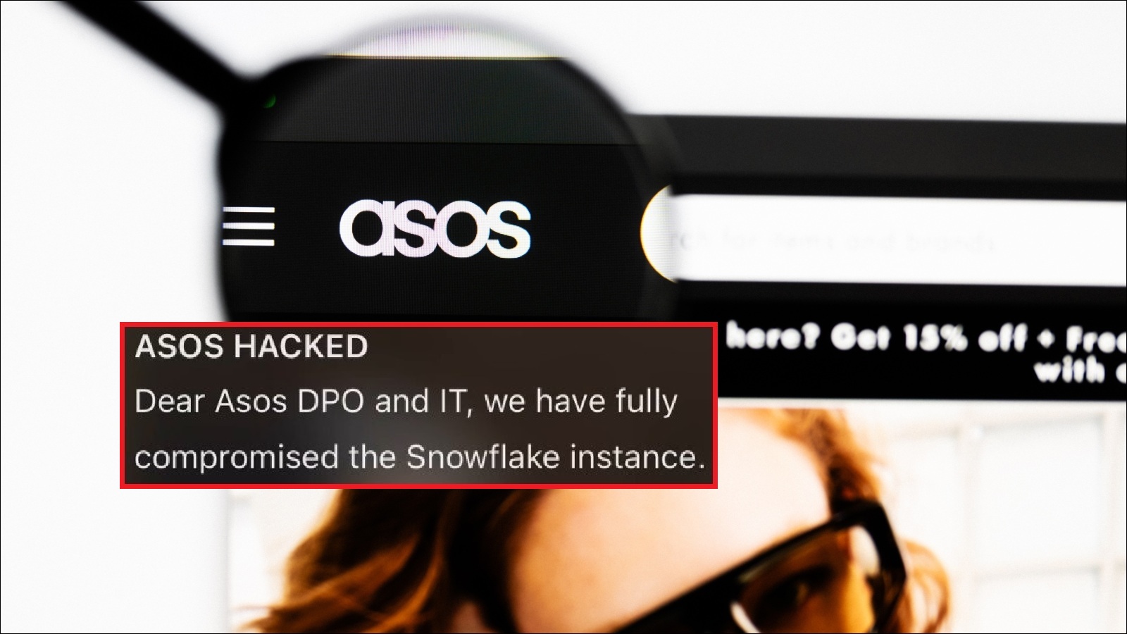 A closeup of the ASOS website, overlaid with a notification which reads 'ASOS HACKED'
