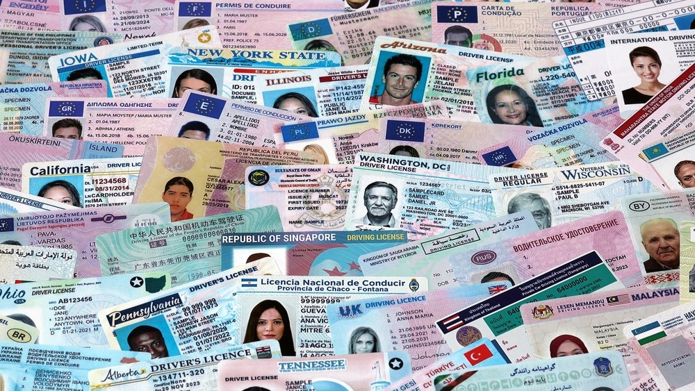 A variety of driver licences spread out.