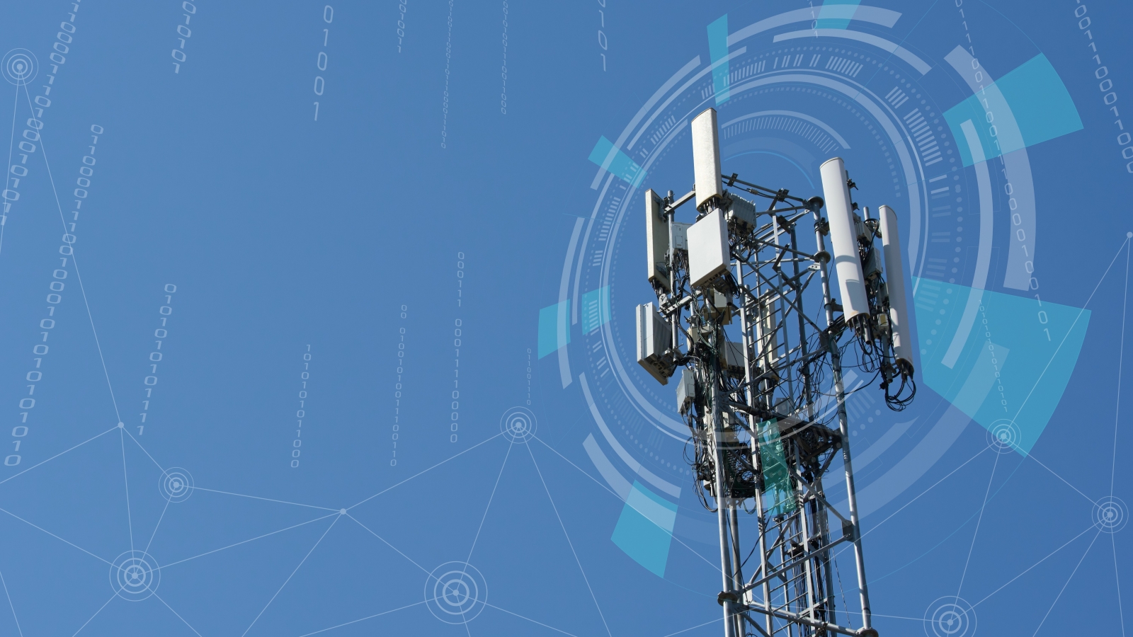 A close up of a mobile tower, with circular graphics surrounding its top section.