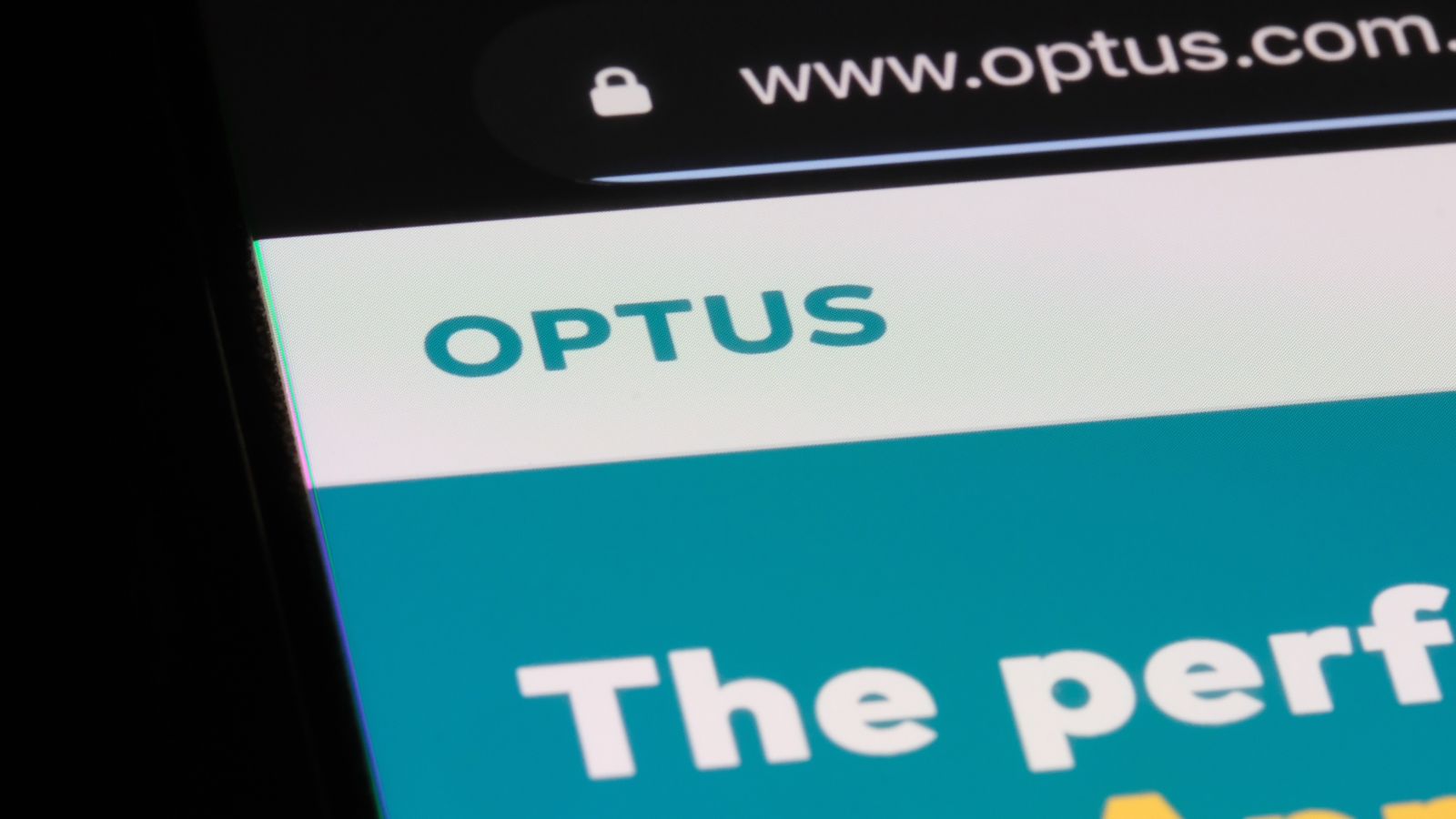 A close up of the Optus website displayed on a smartphone.
