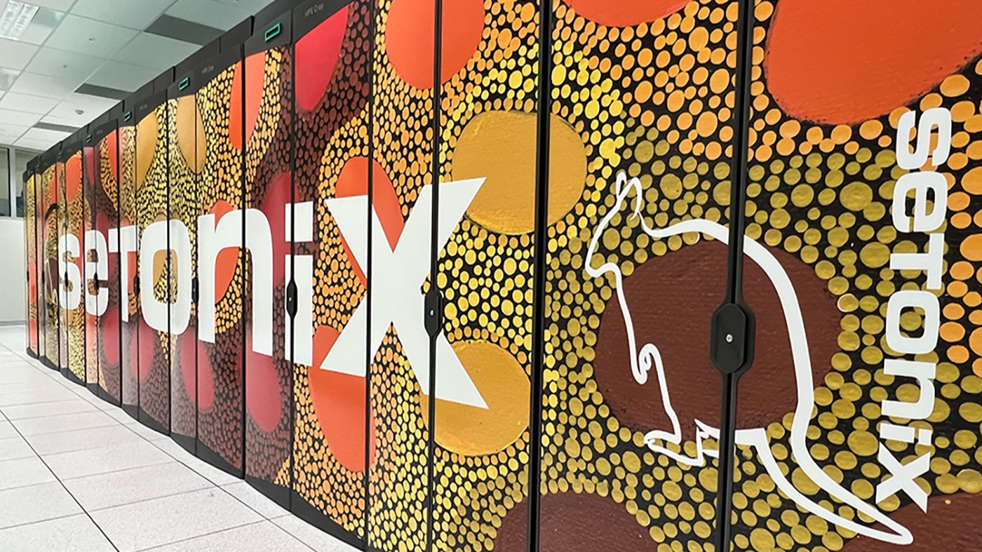A medium shot of Pawsey's Setonix supercomputer, covered in Indigenous art.