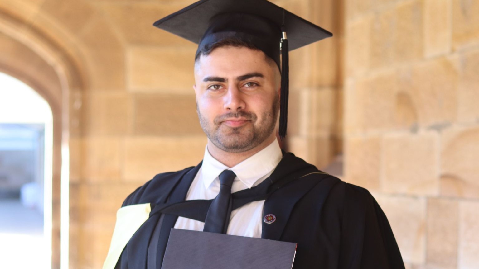 Sepehr Saryazdi in graduation garb.