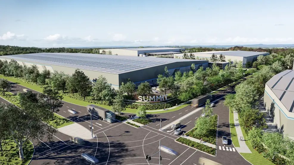 An artist's render of roads near a business park with large builds and a sign on the front which reads Summit.