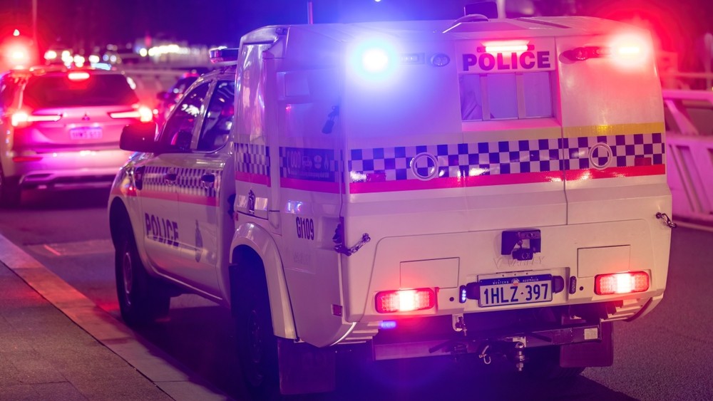 Police car with lights on.